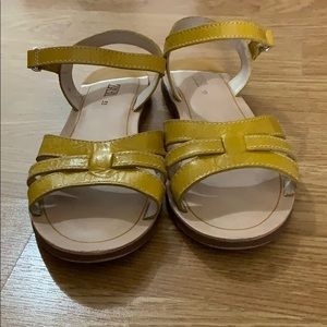 Girl’s mustard yellow sandals
